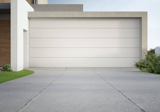 Residential concrete driveway with a typical concrete design